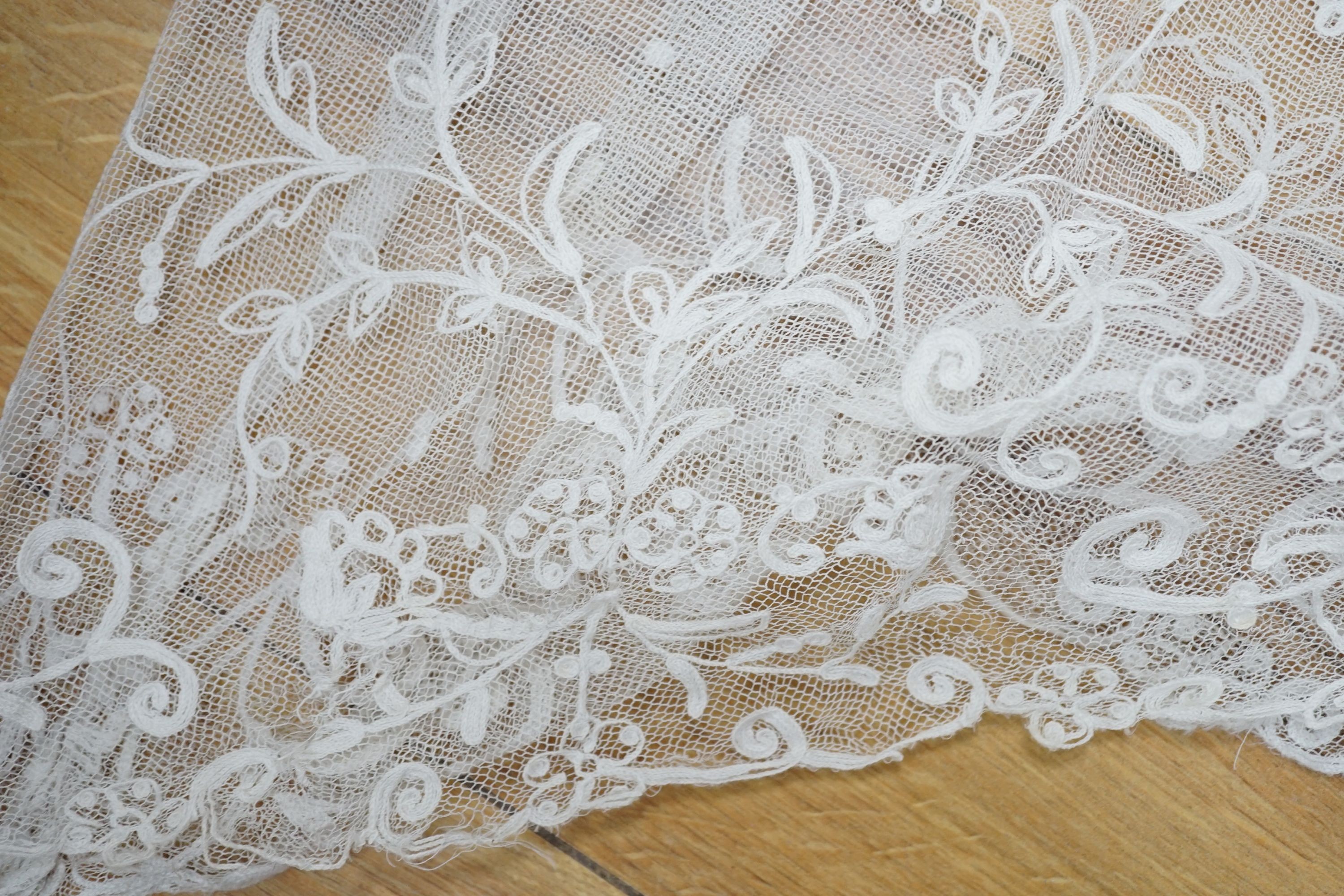 A needle lace skirt panel, a similar stole, various machine laces and trimmings
